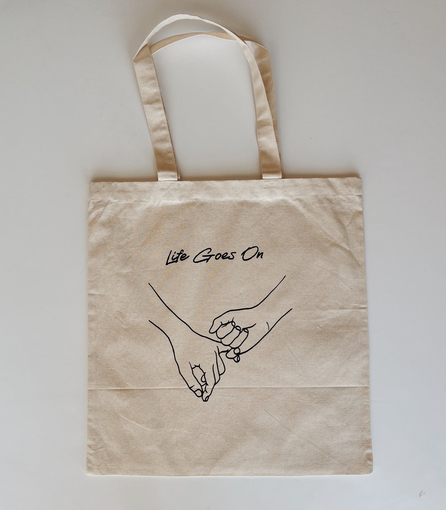 Life Goes On Tote Bag