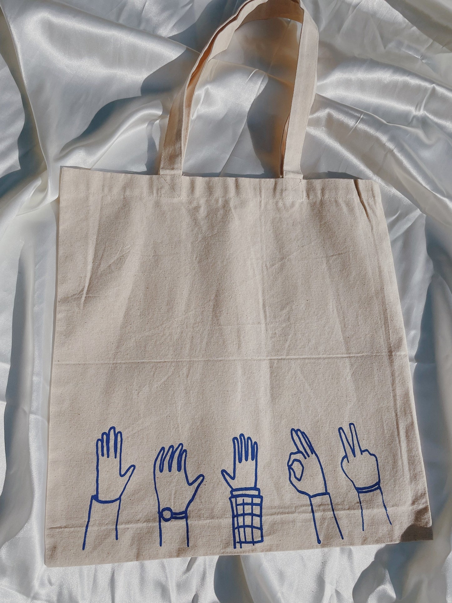 Raised Hands Tote Bag