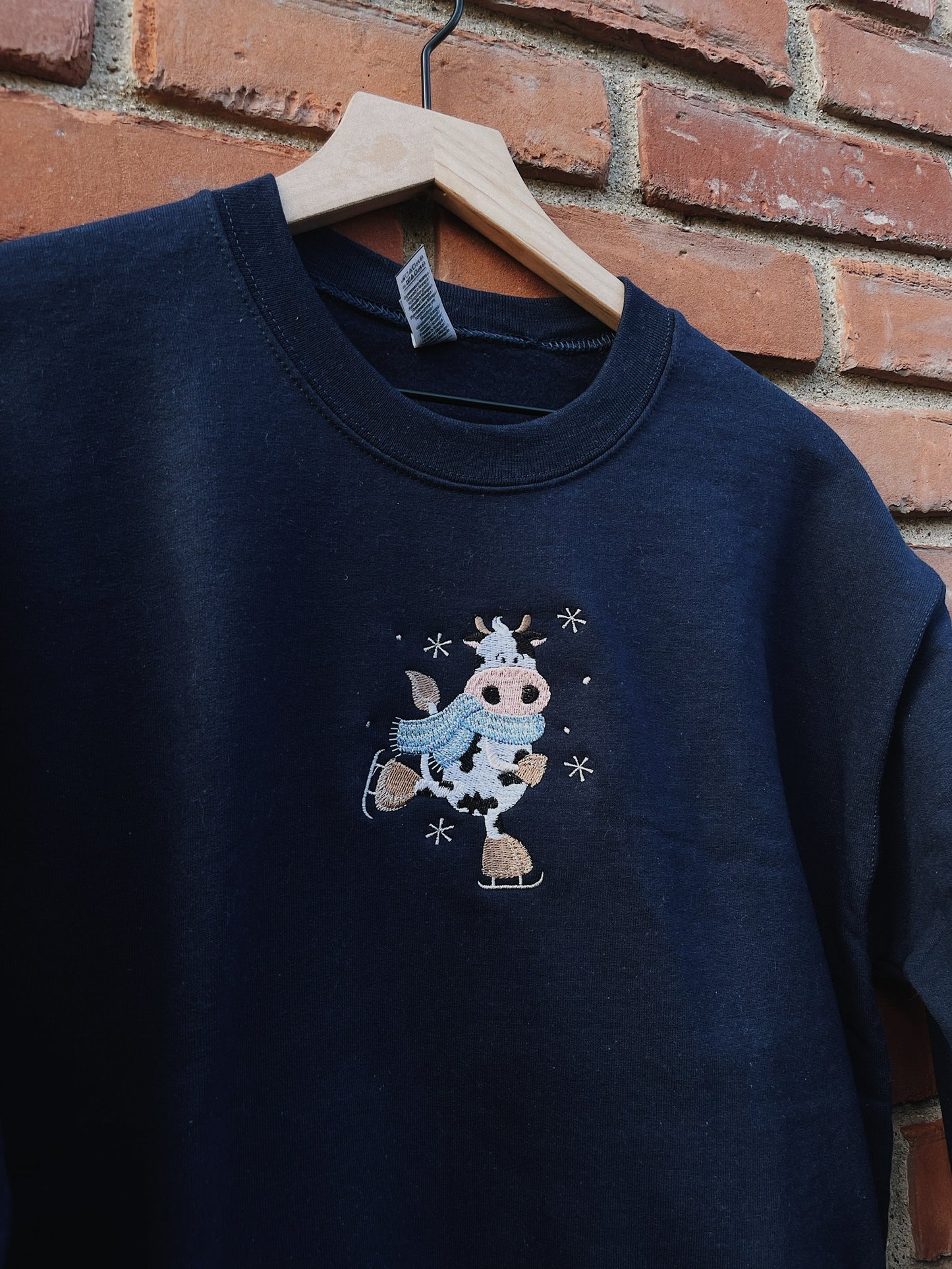 Ice Skating Cow Embroidered Sweatshirt