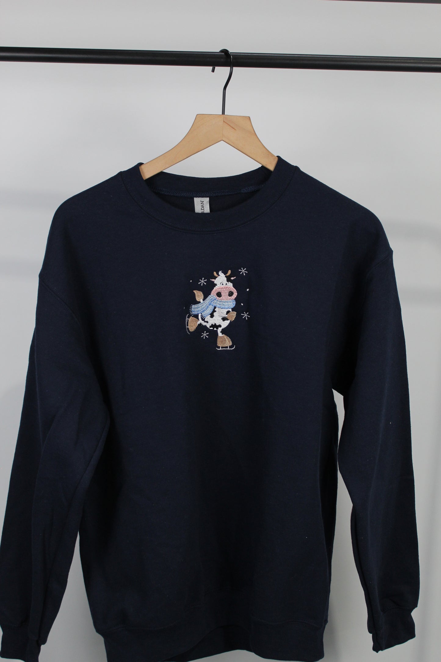 Ice Skating Cow Embroidered Sweatshirt