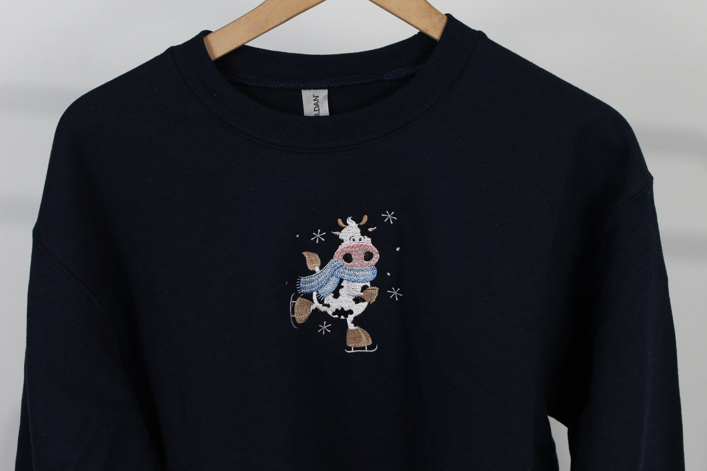 Ice Skating Cow Embroidered Sweatshirt