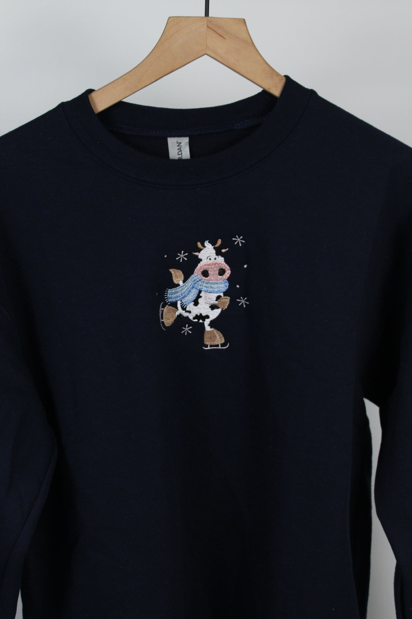 Ice Skating Cow Embroidered Sweatshirt