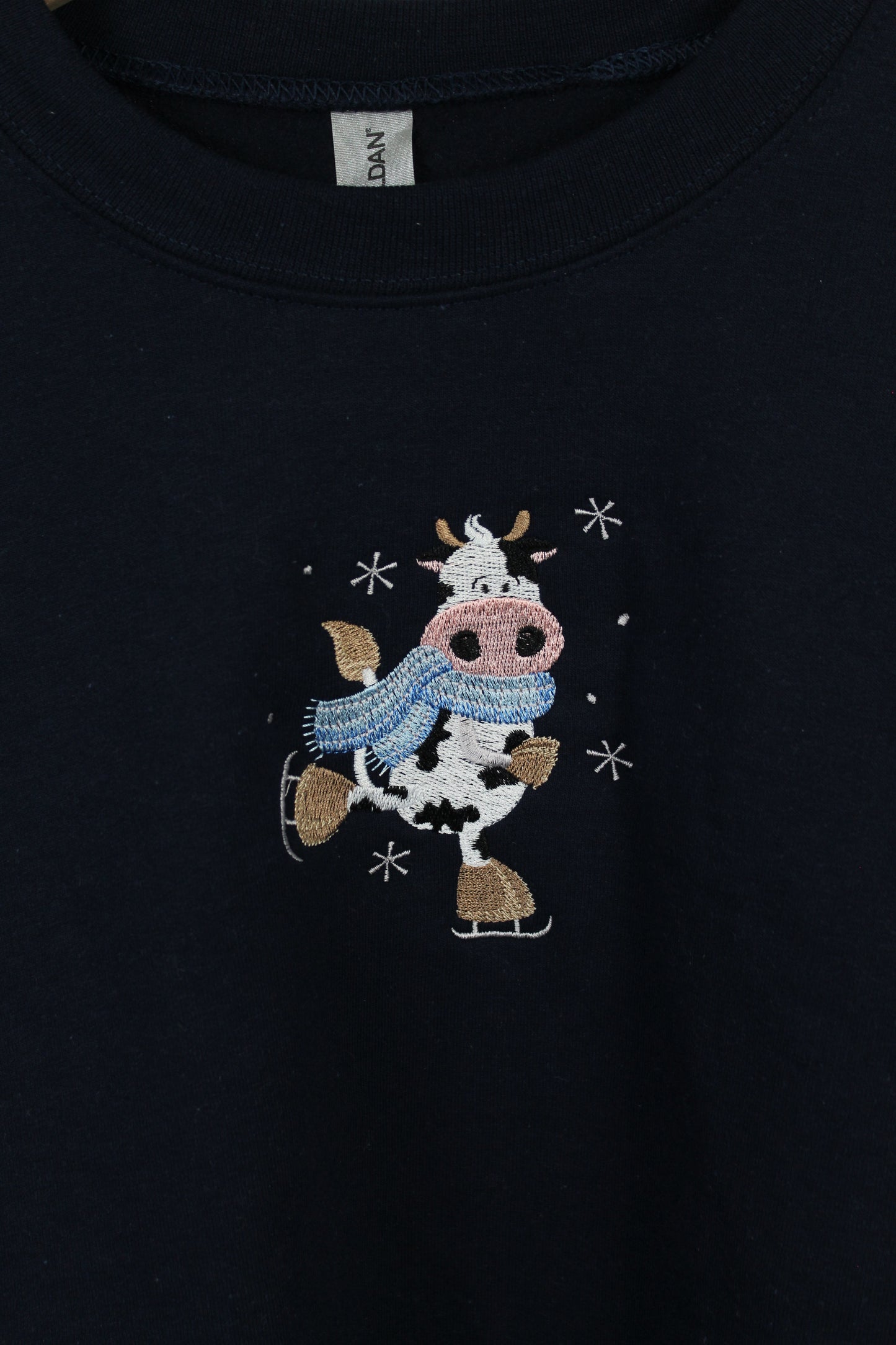 Ice Skating Cow Embroidered Sweatshirt