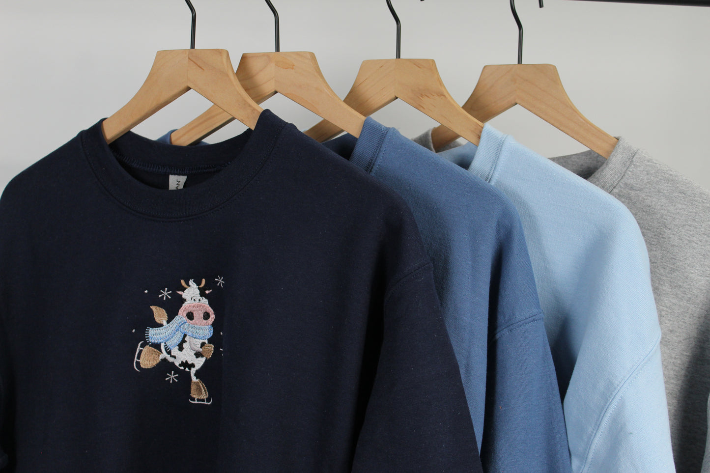 Ice Skating Cow Embroidered Sweatshirt