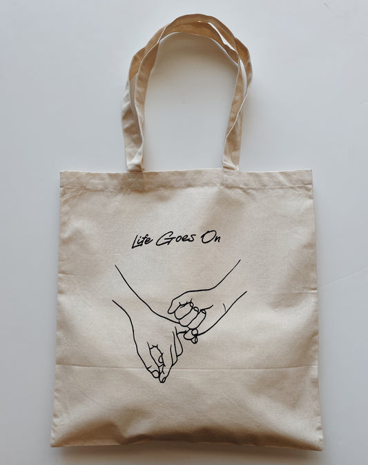 Life Goes On Tote Bag