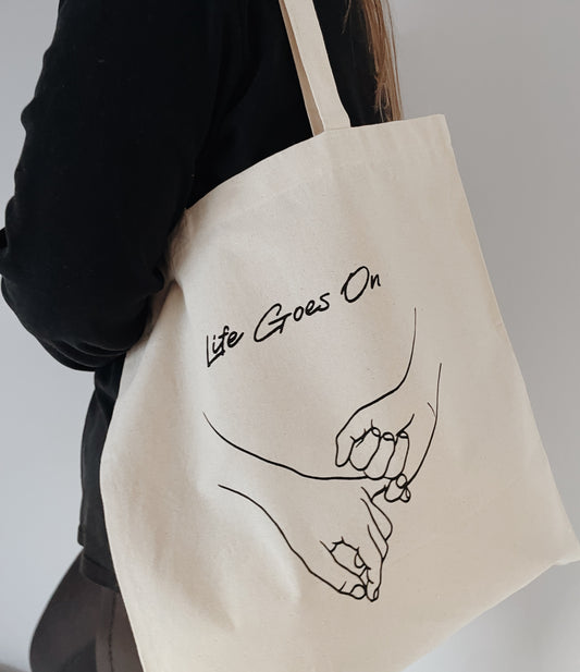 Life Goes On Tote Bag
