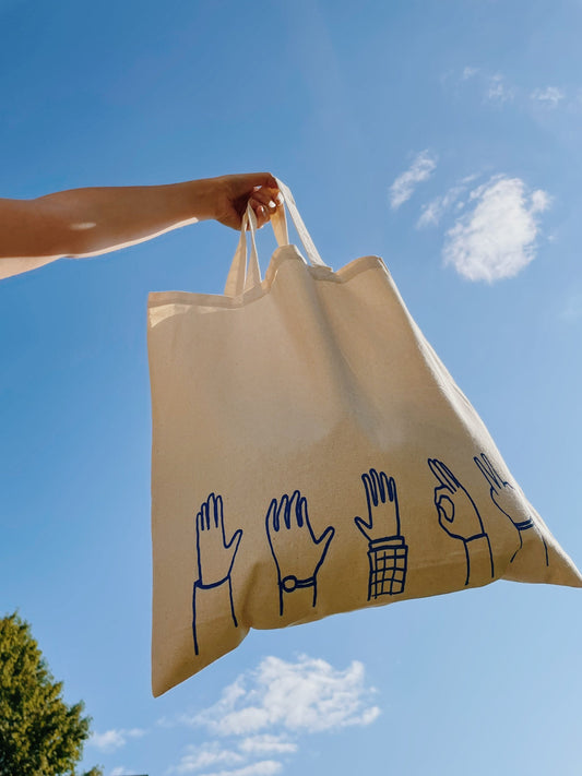 Raised Hands Tote Bag